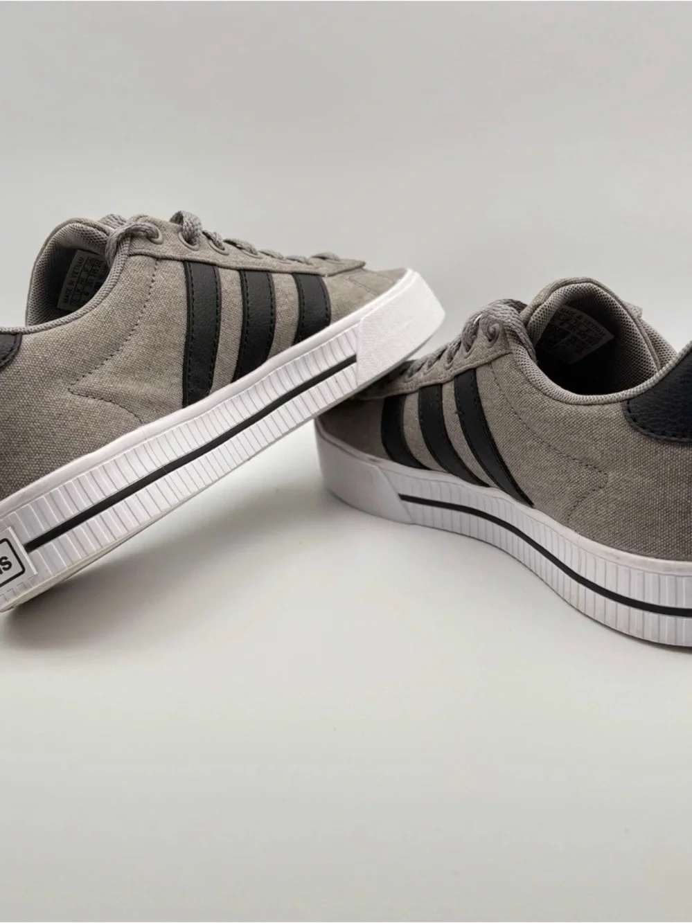 adidas Men’s Gray Canvas Sneakers with Black Stripes